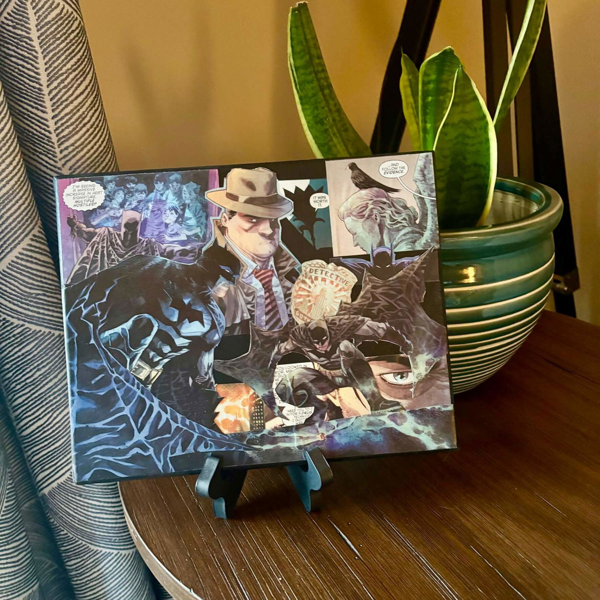Detective in the Dark | Comic Collage | 8x10 | ORIGINAL - Detective in the Dark | Comic Collage | 8x10 | ORIGINAL - Dorrin Gingerich Art - A comic book cover featuring Batman, titled "Detective-in-the-Dark," displayed on a side table in a cozy living room.