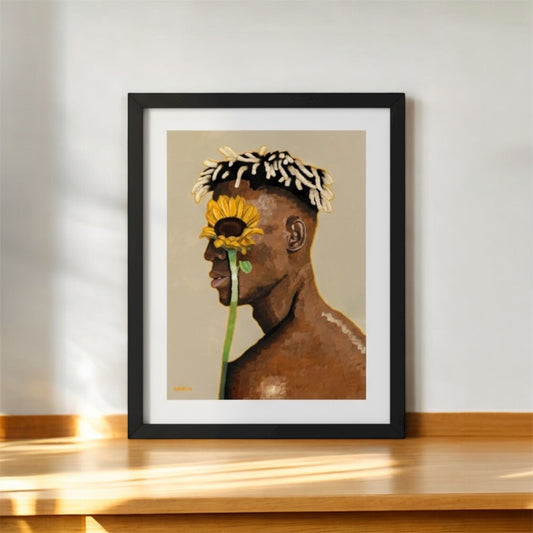 Framed artwork of a person with a sunflower on a beige background