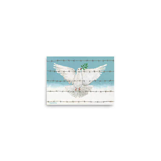 White dove with olive branch on barbed wire against a blue sky