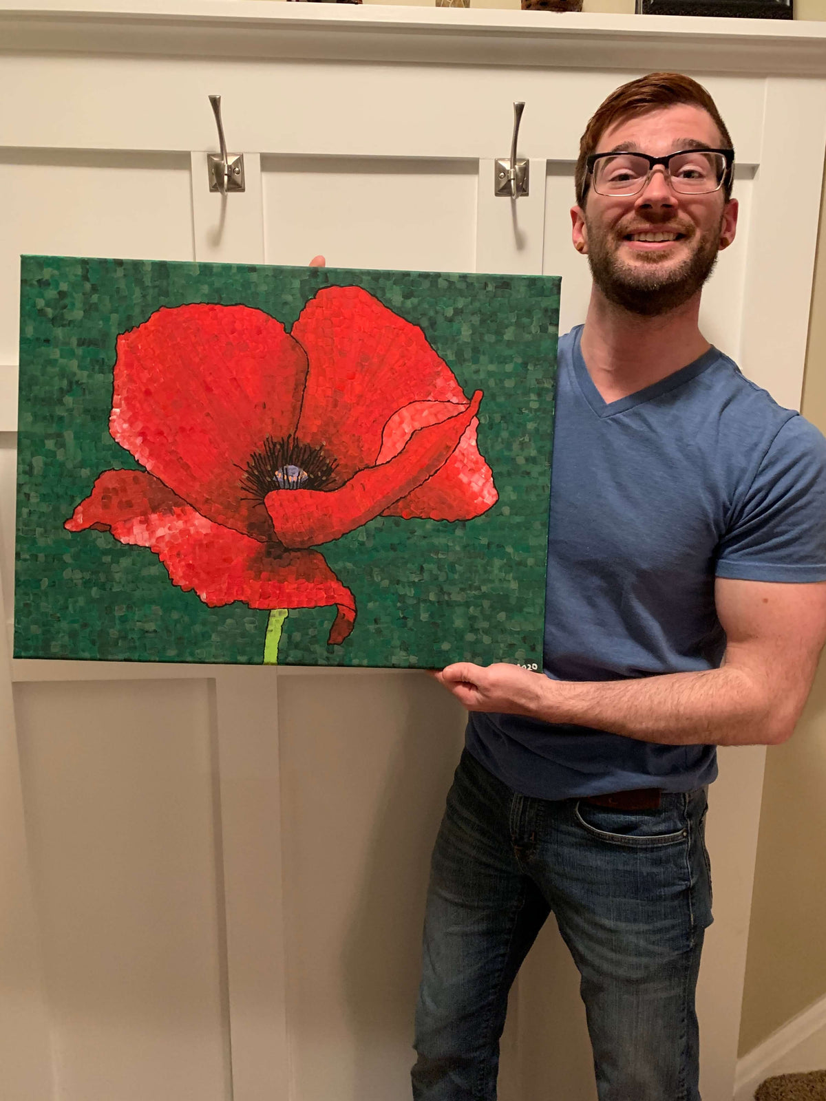 Dorrin Gingerich holding Poppy 1 original prints – inspiring art prints and affordable artwork.