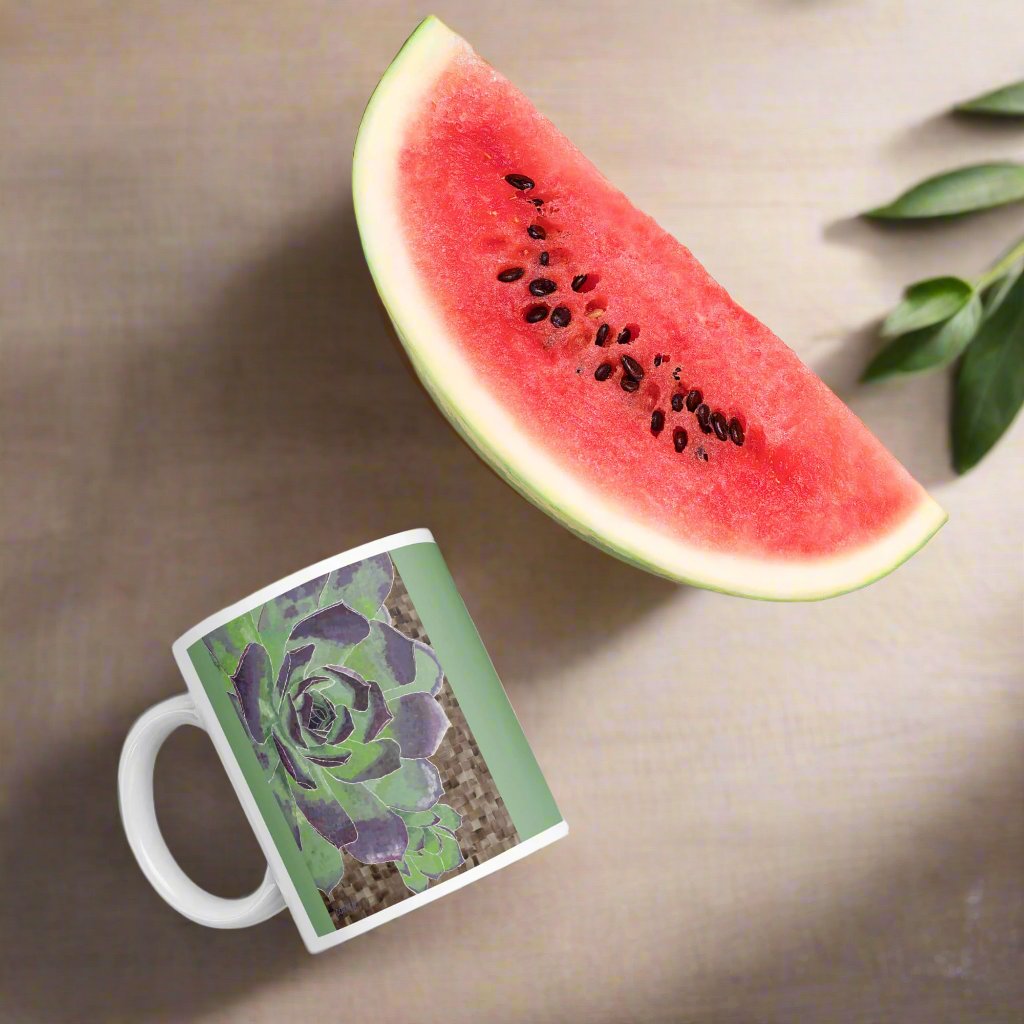 Succulent Mug - Succulent Mug - Dorrin Gingerich Art - A vibrant watermelon next to a green mug featuring succulent artwork, showcasing a refreshing summer vibe.
