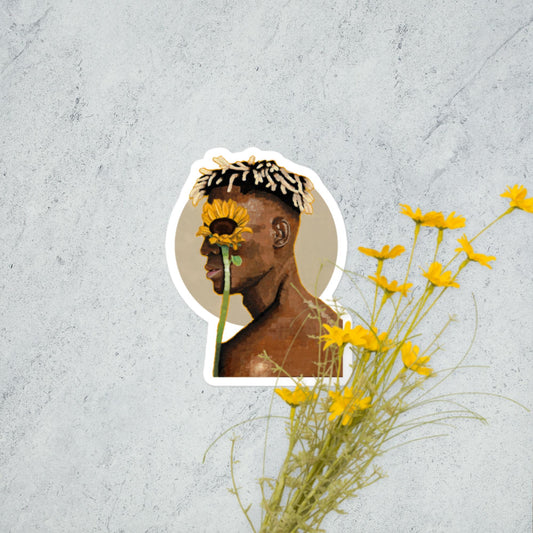 Portrait of a person with a sunflower against a textured gray background