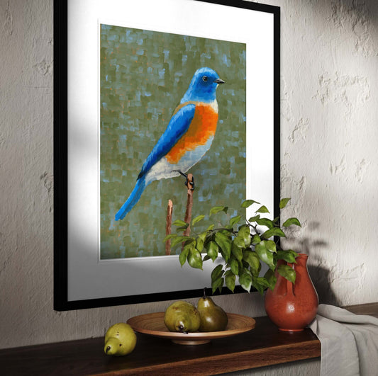 Large framed eastern bluebird art print above wood console with pears and terracotta vase