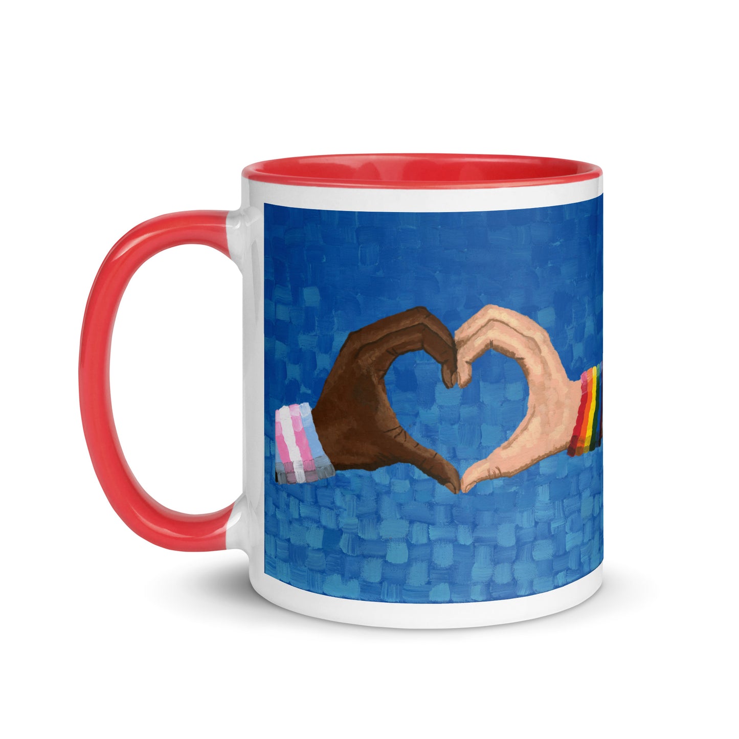 White ceramic 11 oz Loving Pride mug with red interior and handle — a vibrant LGBTQ artwork featuring two hands forming a heart, symbolizing love in art, pride in painting, and inclusion for the LGBTQ community.