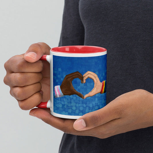 Person holding the Loving Pride mug, a piece of LGBTQ artwork celebrating love, unity, and pride in art — perfect for everyday use and meaningful gifting.