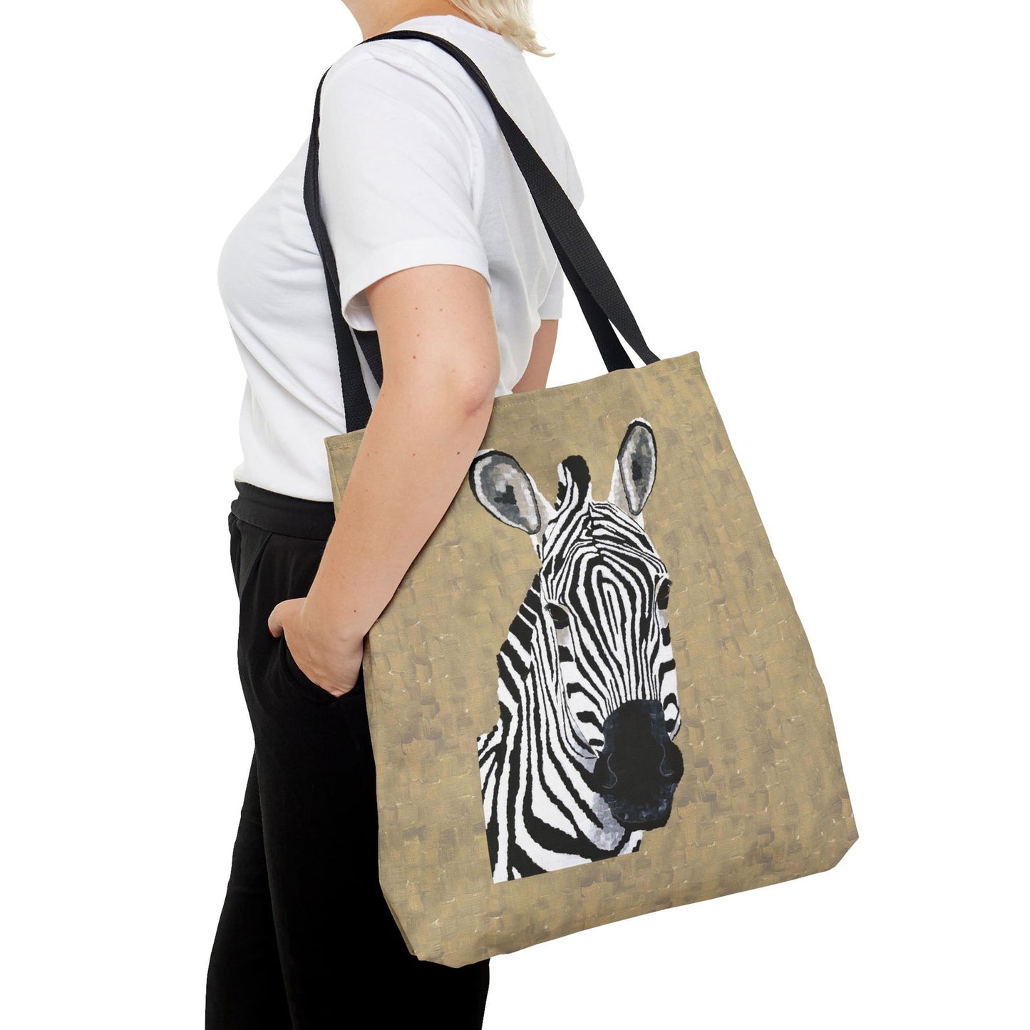 Studio shot of female model wearing Zebra tote bag — bold zebra art print with chic wildlife canvas art influence.