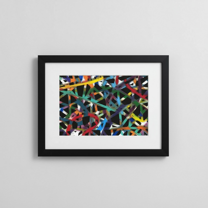 Framed abstract artwork with colorful geometric design on a gray background