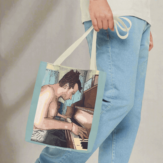 Ivory Keys Tote Bag - Ivory Keys Tote Bag - Dorrin Gingerich Art - A man holding a tote bag featuring a painting of a man playing the piano titled Ivory Keys.