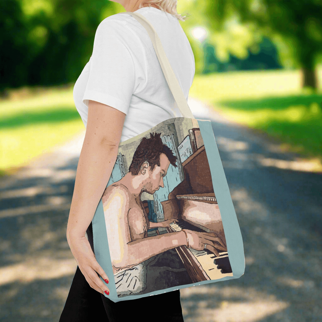Ivory Keys Tote Bag - Ivory Keys Tote Bag - Dorrin Gingerich Art - Woman holding tote bag with painting of man playing piano, titled Ivory Keys.