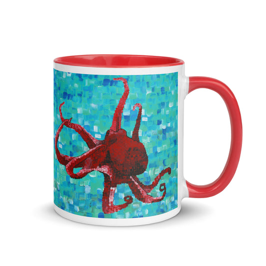 Mug with red octopus design on a blue mosaic background