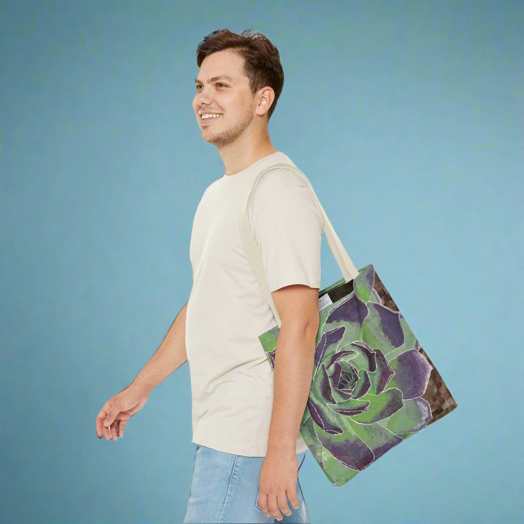 Succulent Tote Bag - Succulent Tote Bag - Dorrin Gingerich Art - A man walks with a succulent tote bag featuring a vibrant green and purple flower design.