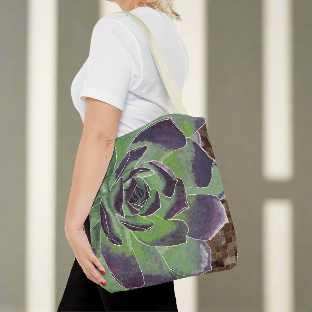 Succulent Tote Bag - Succulent Tote Bag - Dorrin Gingerich Art - A woman proudly displays a stylish green and purple succulent tote bag, showcasing her love for unique floral designs.