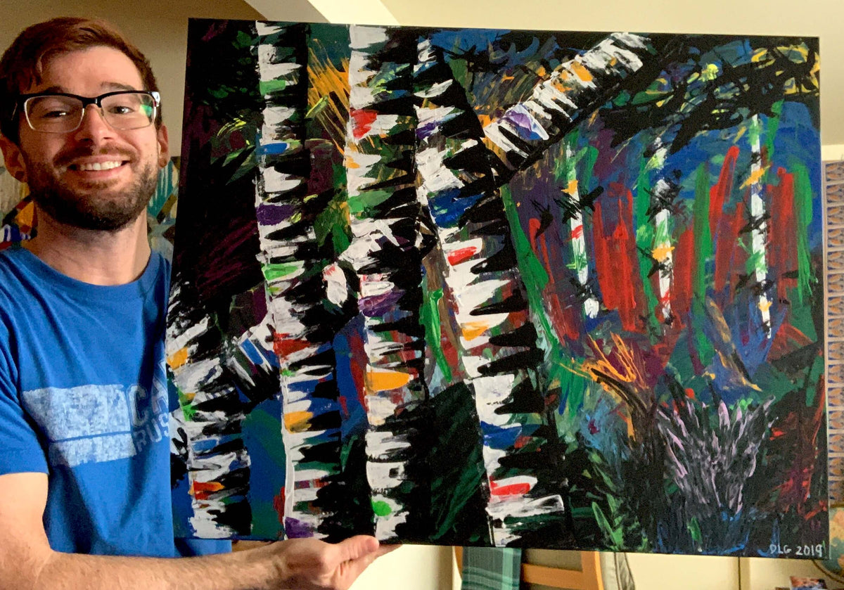Artist Dorrin Gingerich holding the original Active Forest 3 painting