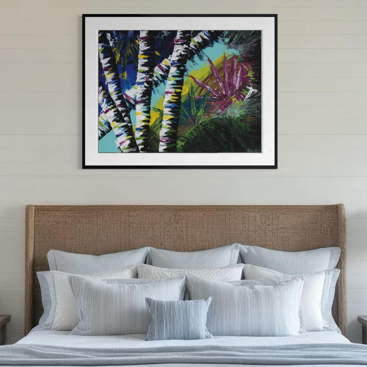 Framed Active Forest 4 abstract print hanging above a bed with layered pillows