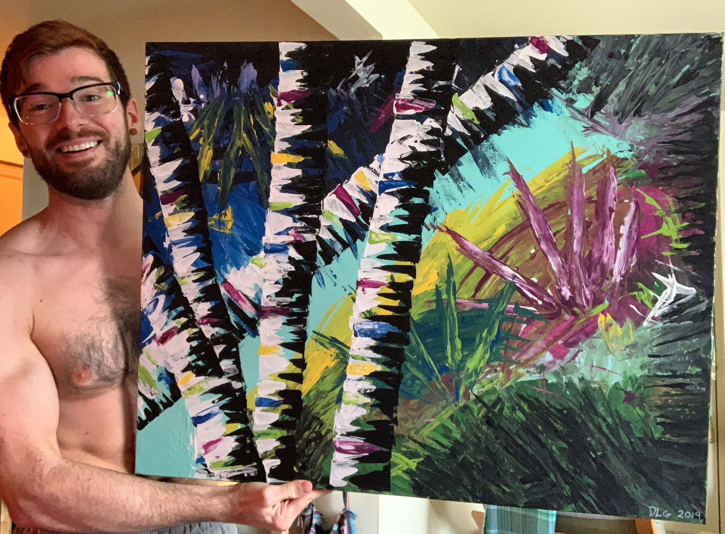 Artist Dorrin Gingerich holding the original Active Forest 4 painting