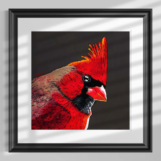 Framed artwork of a red cardinal bird on a gray background