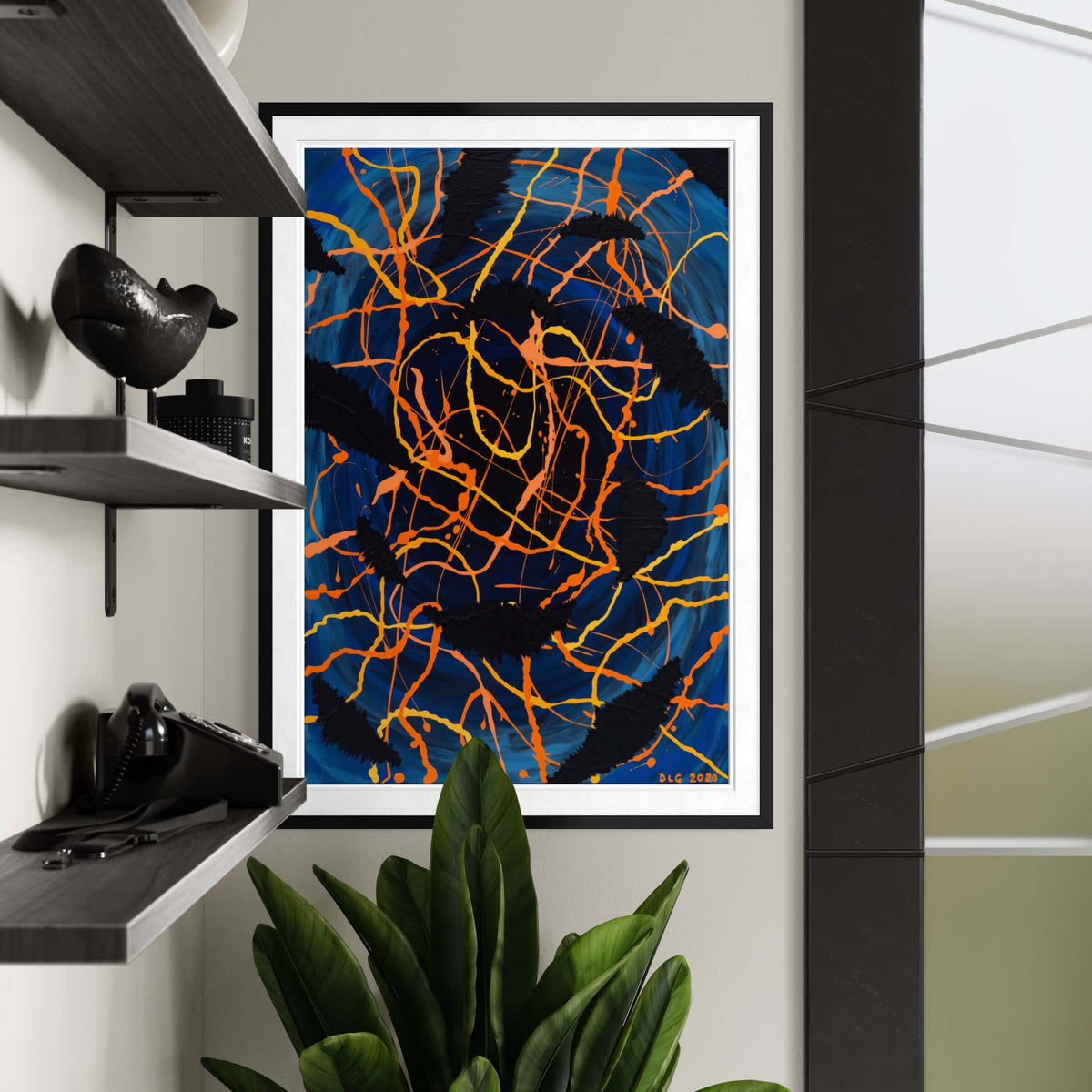 Darkness Conspiers 2 framed print hanging above eclectic shelves styled with vintage decor