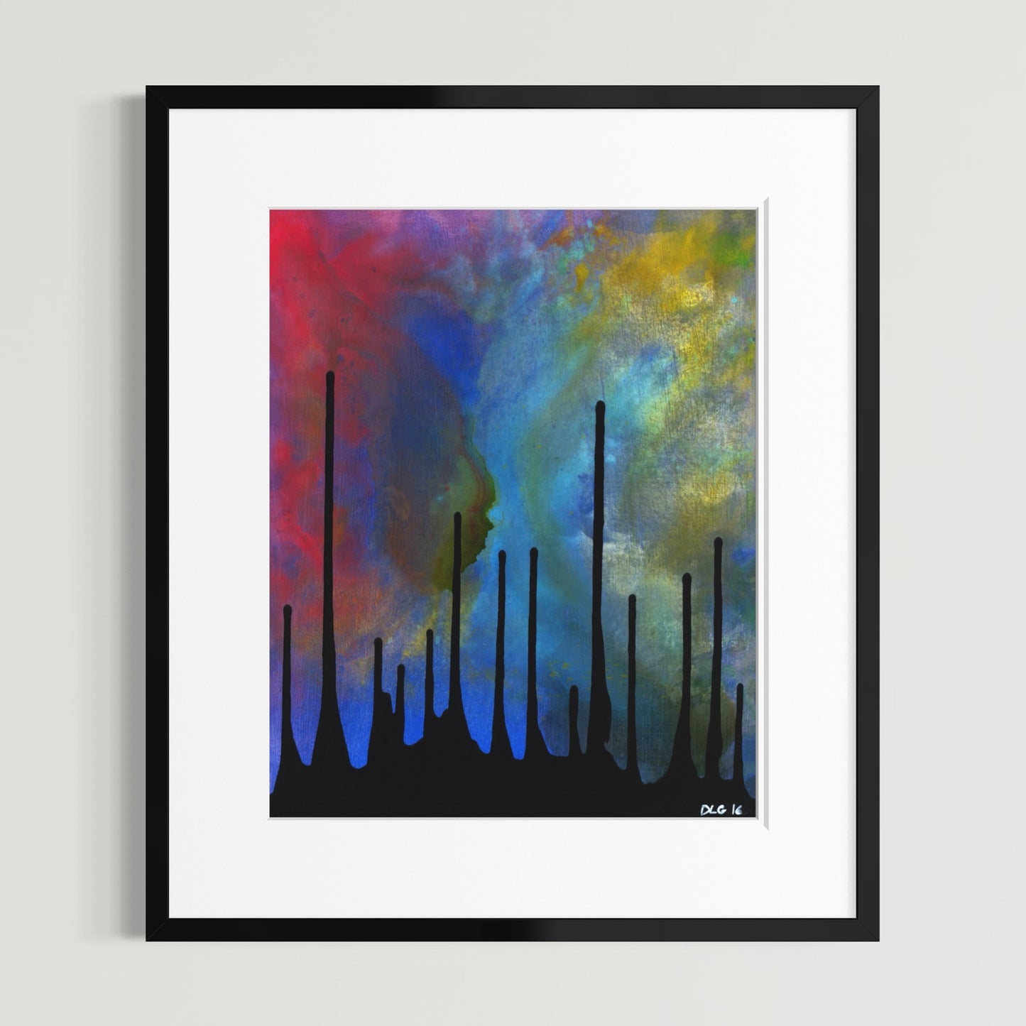 Framed abstract wall art featuring a colorful background with red, blue, and yellow tones, overlaid with black vertical brushstroke-like forms. The artwork is shown in a black frame with a white mat against a light gray wall.