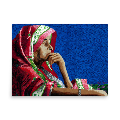 Person wearing a red and green patterned headscarf with a blue textured background