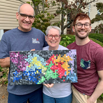 Artist Dorrin Gingerich with the couple who bought the original First painting