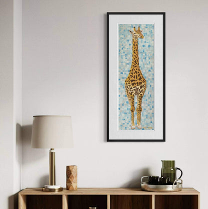 Giraffe wildlife art print framed above wood credenza in neutral modern room