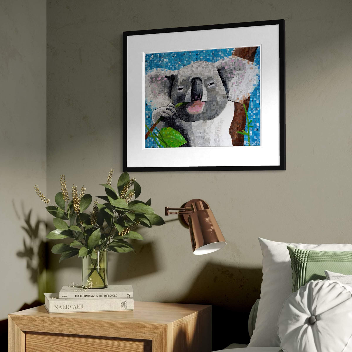 Koala wall art framed above a wooden nightstand in a bedroom