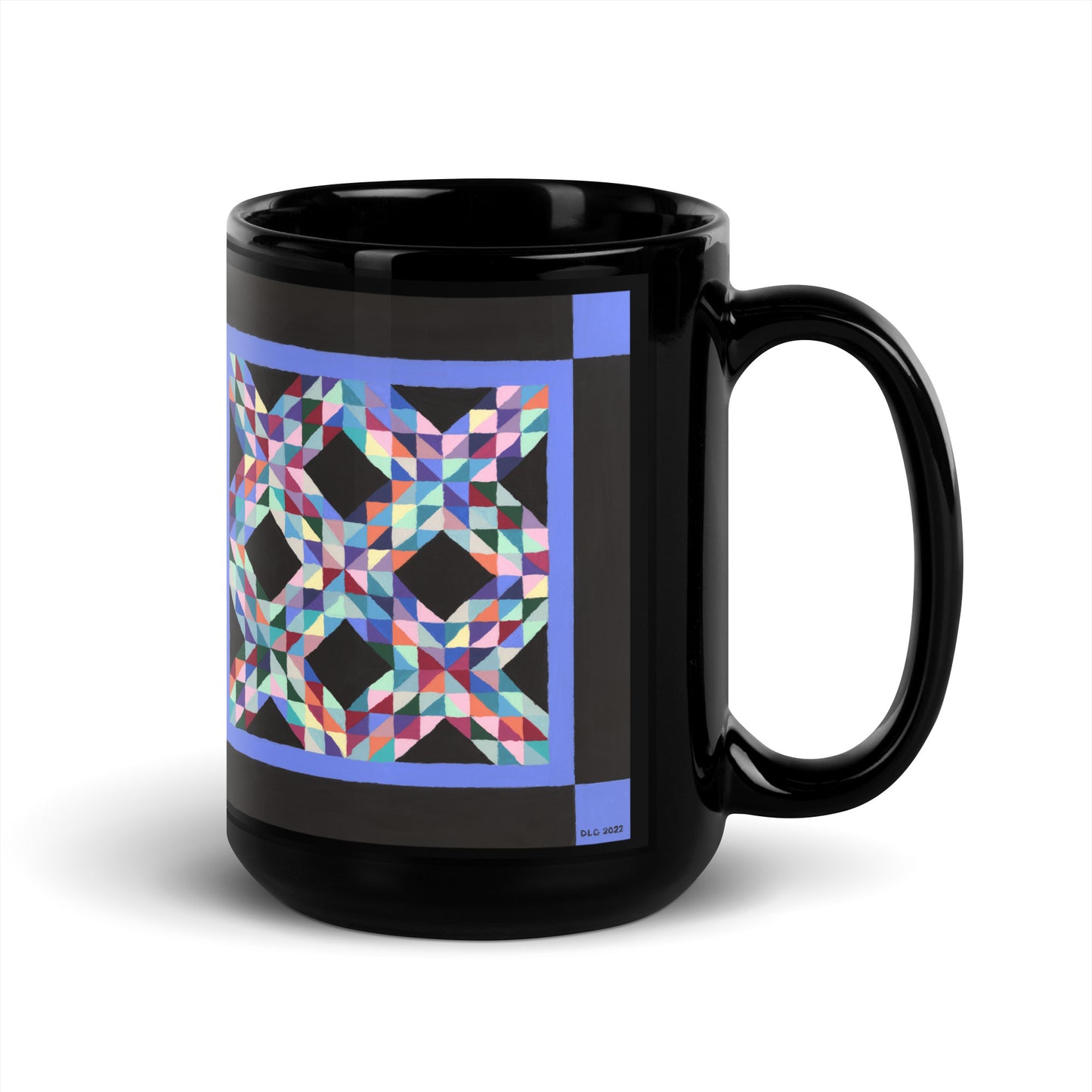 black 15 ounce coffee mug with colorful Mennonite quilt inspired geometric pattern