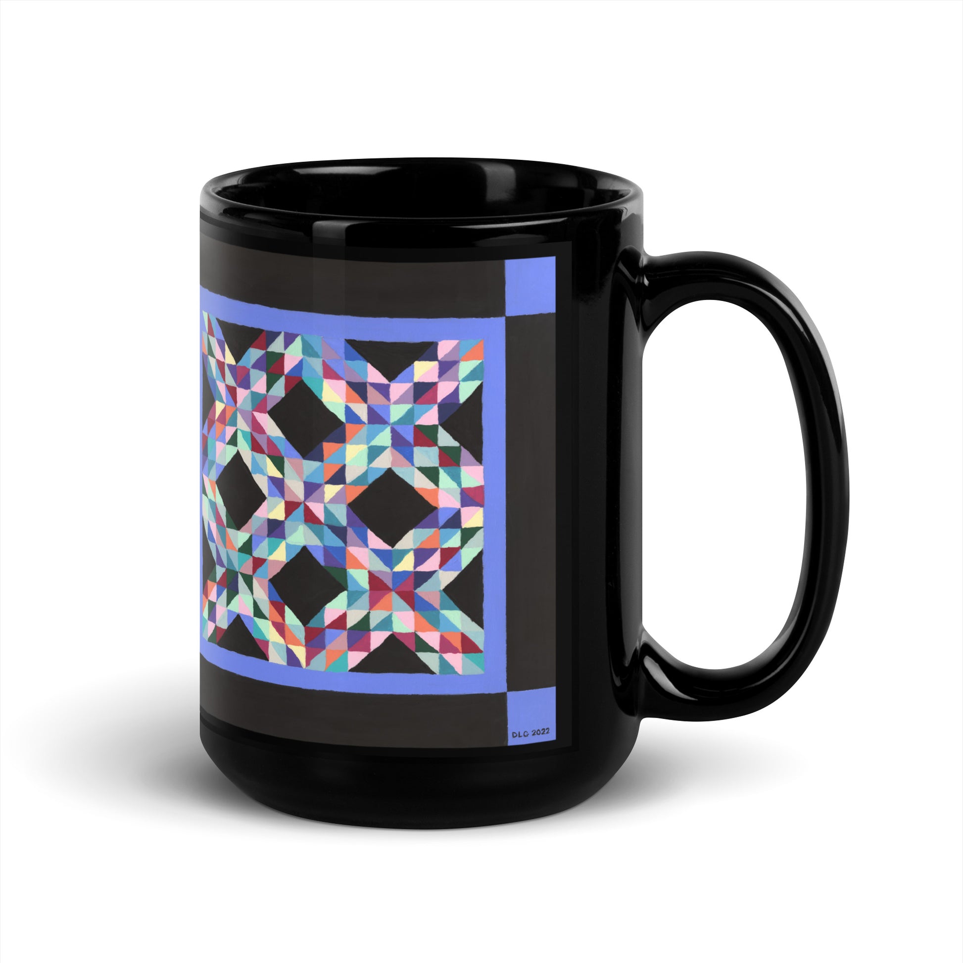 black 15 ounce coffee mug with colorful Mennonite quilt inspired geometric pattern