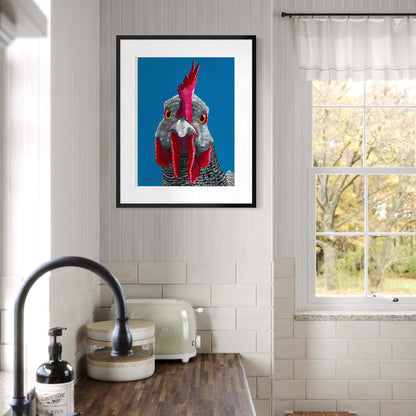 Framed rooster fine art print by Dorrin Gingerich on white shiplap wall in bright farmhouse kitchen