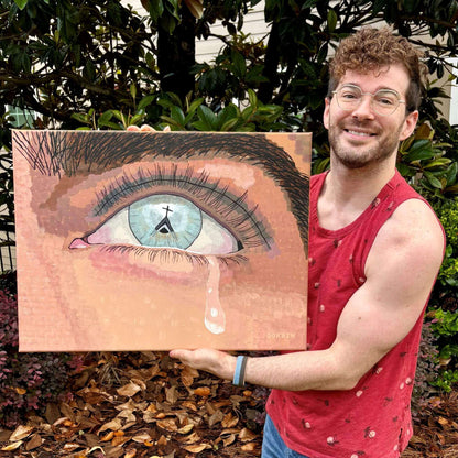 Dorrin Gingerich holding The Faith I Once Knew original painting outdoors