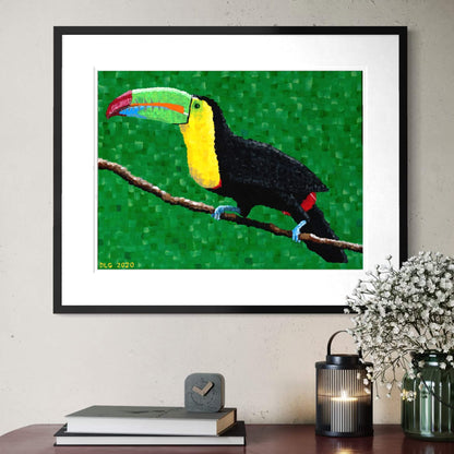 Framed toucan wall art print displayed above a console table in a living room