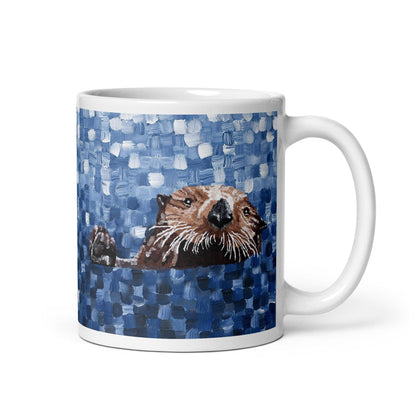 White mug featuring colorful sea otter artwork against a textured blue background Sea Otter | Mug