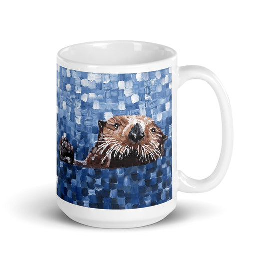 Painted sea otter floating in blue water on a white ceramic coffee mug