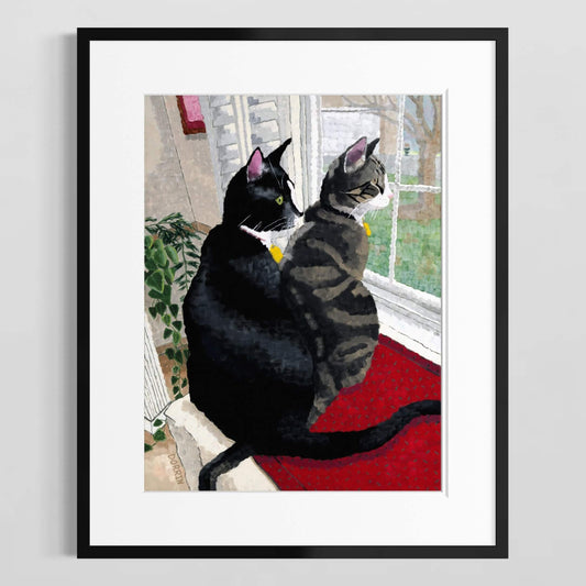 Framed Window Watchers cat print on a black frame against a plain white wall