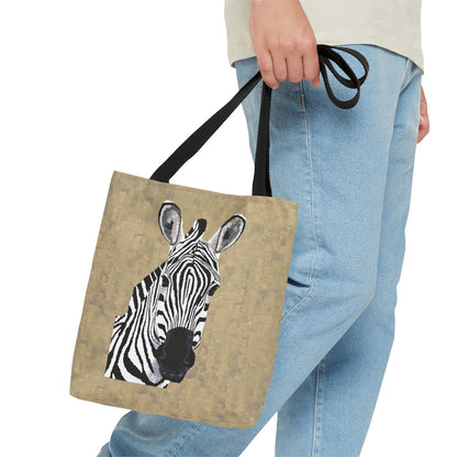 Male model holding Zebra 1 tote bag on display — showcases bold animal wall art style with original zebra print artwork by Dorrin Gingerich.